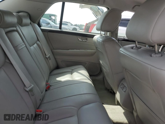 2010 Cadillac DTS 1SA z VIN 1G6KA5EY5AU111898, wystawiony jako Copart lot #54946955 z przebiegiem 44 259 mil mil oraz Szkoda całkowita • Salvage title. Historia ofert i sprzedaży dostępna na DreamBid. Obrazek 10.