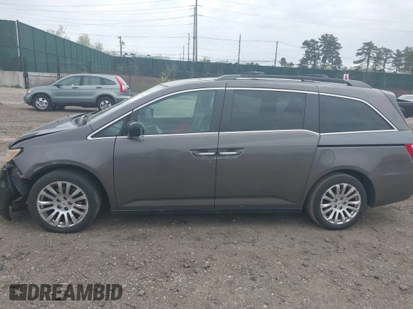 2011 Honda Odyssey EX with VIN 5FNRL5H49BB082706, listed as a IAAI auction lot 42080414 with 228,176 mi miles and . Bid and sale history available at carsss.com. Image 14.