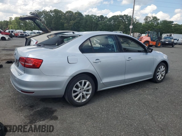 2015 Volkswagen Jetta SE z VIN 3VWD17AJ4FM417218, wystawiony jako Copart lot #61001125 z przebiegiem 84 159 mil mil oraz Szkoda całkowita • Salvage title. Historia ofert i sprzedaży dostępna na DreamBid. Obrazek 3.