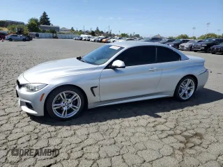 2015 BMW 4 Series 428i with VIN WBA3V7C5XF5A24641, listed as a Copart auction lot 61195125 with 60,499 mi miles and Salvage title. Bid and sale history available at DreamBid. Image 1.
