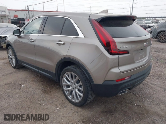 2023 Cadillac XT4 FWD Luxury z VIN 1GYAZAR43PF152992, wystawiony jako IAAI lot #42160015 z przebiegiem 29 466 mil mil oraz . Historia ofert i sprzedaży dostępna na DreamBid. Obrazek 3.