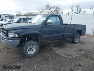 1995 Dodge Ram 1500 with VIN 1B7HF16Y1SS150002, listed as a IAAI auction lot 41874613 with 305,502 mi miles. Bid and sale history available at carsss.com. Image 2.