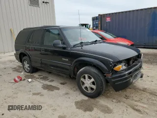 1998 Oldsmobile Bravada z VIN 1GHDT13W9W2730673, wystawiony jako Copart lot #80996524 z przebiegiem 126 418 mil mil oraz Nie do naprawy. Historia ofert i sprzedaży dostępna na DreamBid. Obrazek 4.
