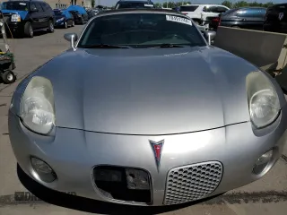 2006 Pontiac Solstice z VIN 1G2MB33B16Y107714, wystawiony jako Copart lot #70491744 z przebiegiem 53 925 mil mil oraz Szkoda całkowita • Salvage title. Historia ofert i sprzedaży dostępna na DreamBid. Obrazek 5.