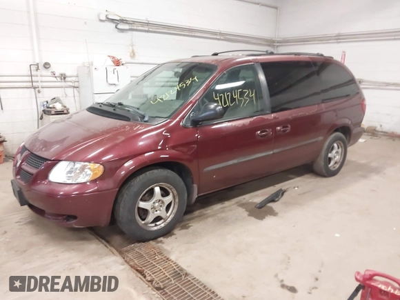 2002 Dodge Caravan Sport with VIN 2B4GP44302R731605, listed as a IAAI auction lot 42124534 with 166,086 mi miles and . Bid and sale history available at carsss.com. Image 2.