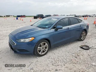 2018 Ford Fusion SE z VIN 3FA6P0HD2JR109726, wystawiony jako Copart lot #63114405 z przebiegiem 136 334 mil mil oraz Czysty tytuł • Clean title. Historia ofert i sprzedaży dostępna na DreamBid. Obrazek 1.
