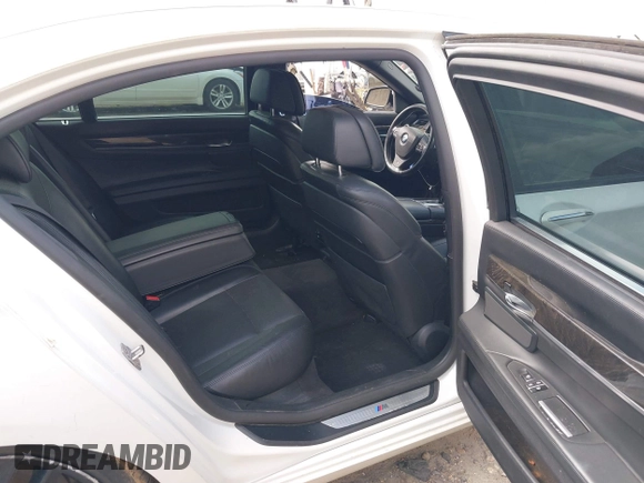 2015 BMW 7 Series 750Li with VIN WBAYE8C54FD780951, listed as a IAAI auction lot 41813038 with 103,131 mi miles. Bid and sale history available at carsss.com. Image 8.