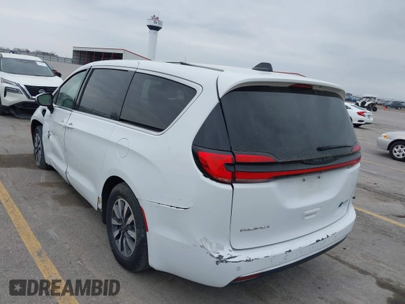 2023 Chrysler Pacifica Hybrid Touring L z VIN 2C4RC1L74PR540870, wystawiony jako IAAI lot #42056528 z przebiegiem 46 940 mil mil oraz . Historia ofert i sprzedaży dostępna na DreamBid. Obrazek 20.