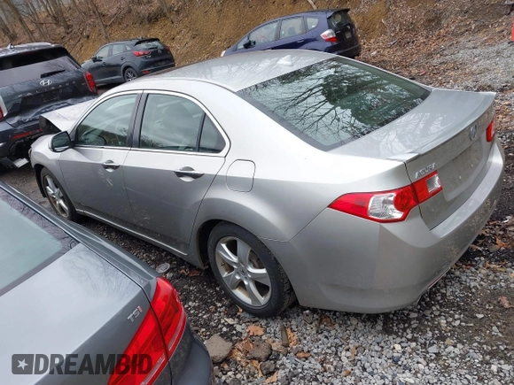 2010 Acura TSX with VIN JH4CU2F64AC031288, listed as a IAAI auction lot 42023406 with 144,192 mi miles. Bid and sale history available at carsss.com. Image 3.