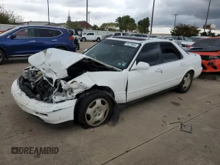 1995 Acura Legend L with VIN JH4KA7663SC007776, listed as a Copart auction lot 79210664 with 142,872 mi miles and Salvage Title. Bid and sale history available at DreamBid. Image 1.