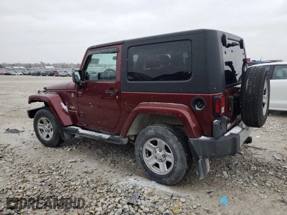 2008 Jeep Wrangler Sahara z VIN 1J4FA54128L561392, wystawiony jako Copart lot #50216865 z przebiegiem 183 825 mil mil oraz Czysty tytuł • Clean title. Historia ofert i sprzedaży dostępna na DreamBid. Obrazek 2.
