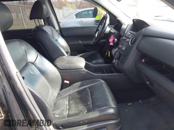 2012 Honda Pilot Touring with VIN 5FNYF4H96CB041380, listed as a IAAI auction lot 41941615 with 137,537 mi miles and . Bid and sale history available at DreamBid. Image 5.