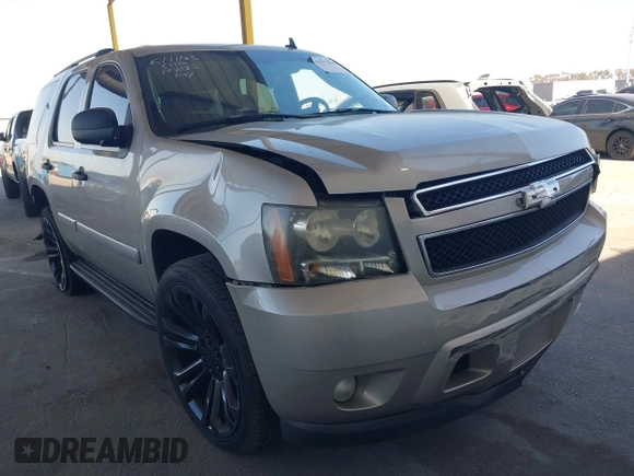 2007 Chevrolet Tahoe LS z VIN 1GNFC13C17R293787, wystawiony jako IAAI lot #42517818 z przebiegiem 293 307 mil mil oraz . Historia ofert i sprzedaży dostępna na DreamBid. Obrazek 1.