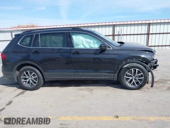 2019 Volkswagen Tiguan SE with VIN 3VV2B7AX6KM066013, listed as a IAAI auction lot 41854035 with 72,322 mi miles and . Bid and sale history available at DreamBid. Image 13.