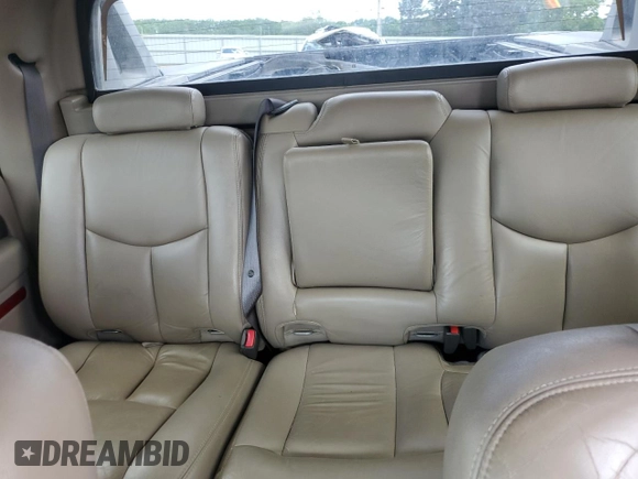 2004 Chevrolet Avalanche z VIN 3GNEK12T34G165255, wystawiony jako Copart lot #55272085 z przebiegiem Nie podano mil oraz Szkoda całkowita • Salvage title. Historia ofert i sprzedaży dostępna na DreamBid. Obrazek 10.