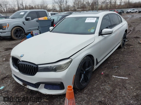 2016 BMW 7 Series 740i with VIN WBA7E2C50GG714647, listed as a IAAI auction lot 41745442 with 134,399 mi miles and . Bid and sale history available at carsss.com. Image 23.