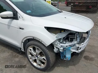 2016 Ford Escape Titanium with VIN 1FMCU9J92GUA71444, listed as a IAAI auction lot 42334603 with 79,780 mi miles and . Bid and sale history available at DreamBid. Image 17.