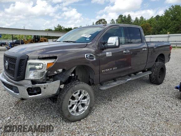 2017 Nissan Titan SL z VIN 1N6BA1F27HN547900, wystawiony jako Copart lot #61768145 z przebiegiem 148 383 mil mil oraz Szkoda całkowita • Salvage title. Historia ofert i sprzedaży dostępna na DreamBid. Obrazek 1.