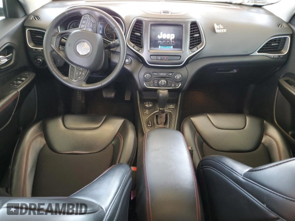 2019 Jeep Cherokee Trailhawk with VIN 1C4PJMBN7KD374676, listed as a Copart auction lot 51504125 with 34,323 mi miles and Salvage Title. Bid and sale history available at DreamBid. Image 8.