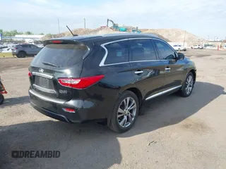 2014 Infiniti QX60 with VIN 5N1AL0MM9EC525598, listed as a IAAI auction lot 42212187 with 146,256 mi miles and . Bid and sale history available at carsss.com. Image 4.