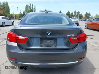 2015 BMW 4 Series 428i with VIN WBA4A5C59FGK15750, listed as a IAAI auction lot 42098856 with 62,530 mi miles and . Bid and sale history available at DreamBid. Image 17.