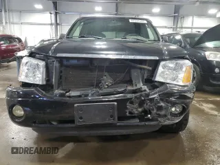 2004 GMC Envoy SLT with VIN 1GKDT13S642191868, listed as a Copart auction lot 82334304 with 150,810 mi miles and Salvage Title. Bid and sale history available at carsss.com. Image 5.