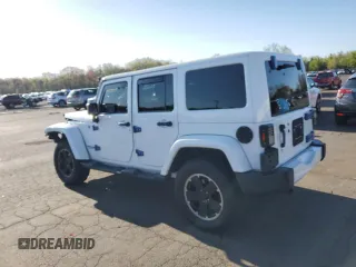 2012 Jeep Wrangler Unlimited Altitude with VIN 1C4HJWEG4CL285314, listed as a Copart auction lot 54494955 with 137,011 mi miles and Salvage title. Bid and sale history available at DreamBid. Image 2.