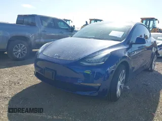 2021 Tesla Model Y Standard Range z VIN 5YJYGDED6MF107711, wystawiony jako IAAI lot #41794384 z przebiegiem 86 934 mil mil oraz . Historia ofert i sprzedaży dostępna na DreamBid. Obrazek 17.