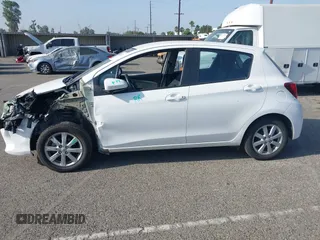 2015 Toyota Yaris L z VIN VNKKTUD36FA054974, wystawiony jako IAAI lot #42542421 z przebiegiem 93 028 mil mil oraz . Historia ofert i sprzedaży dostępna na DreamBid. Obrazek 14.