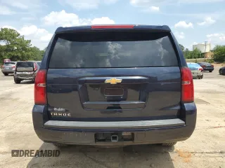2020 Chevrolet Tahoe LT with VIN 1GNSKBKC7LR162186, listed as a Copart auction lot 56729325 with 114,210 mi miles and Salvage title. Bid and sale history available at DreamBid. Image 6.