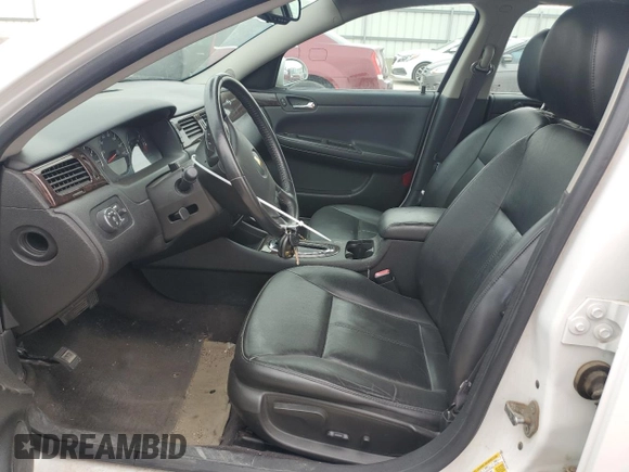 2014 Chevrolet Impala LTZ with VIN 2G1WC5E38E1143767, listed as a Copart auction lot 47768755 with 181,083 mi miles and Salvage Title. Bid and sale history available at DreamBid. Image 7.