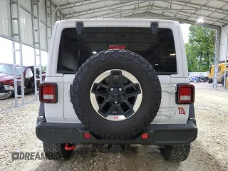 2022 Jeep Wrangler Unlimited Rubicon with VIN 1C4HJXFN8NW129717, listed as a Copart auction lot 54615745 with 33,544 mi miles and Salvage title. Bid and sale history available at DreamBid. Image 6.