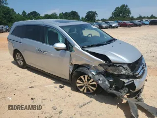 2014 Honda Odyssey EX-L z VIN 5FNRL5H66EB045019, wystawiony jako Copart lot #62899125 z przebiegiem 179 298 mil mil oraz Szkoda całkowita • Salvage title. Historia ofert i sprzedaży dostępna na DreamBid. Obrazek 4.