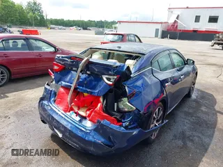 2016 Nissan Maxima SR with VIN 1N4AA6AP7GC398418, listed as a IAAI auction lot 42171994 with 214,232 mi miles and . Bid and sale history available at DreamBid. Image 6.