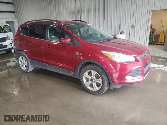 2016 Ford Escape SE with VIN 1FMCU9GXXGUB86959, listed as a Copart auction lot 54616815 with 141,086 mi miles and Clean Title. Bid and sale history available at DreamBid. Image 4.