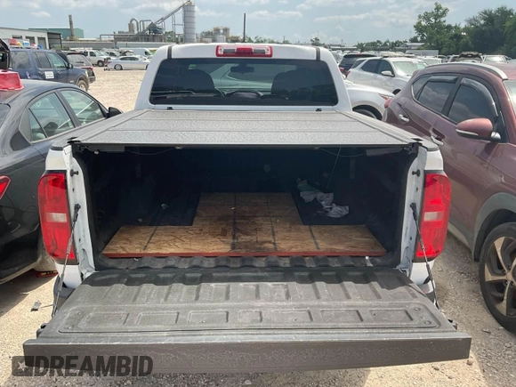 2020 Chevrolet Colorado 4WD Work Truck z VIN 1GCGTBEN8L1146859, wystawiony jako IAAI lot #42561237 z przebiegiem 96 384 mil mil oraz . Historia ofert i sprzedaży dostępna na DreamBid. Obrazek 3.