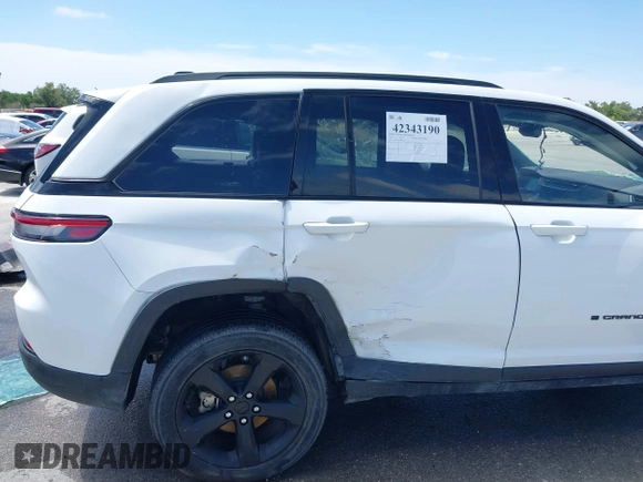 2022 Jeep Grand Cherokee Laredo with VIN 1C4RJHAG1N8627233, listed as a IAAI auction lot 42343190 with 38,107 mi miles and . Bid and sale history available at DreamBid. Image 12.