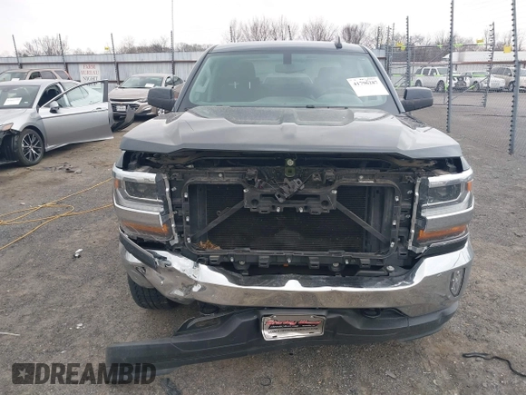 2017 Chevrolet Silverado 1500 LT with VIN 3GCUKREC3HG491481, listed as a IAAI auction lot 41796287 with 59,696 mi miles and . Bid and sale history available at DreamBid. Image 13.