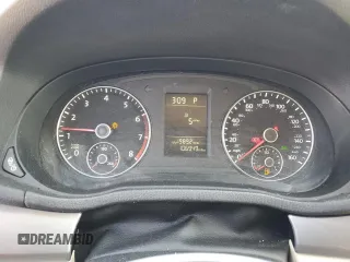 2014 Volkswagen Passat Wolfsburg Edition z VIN 1VWAT7A32EC036093, wystawiony jako Copart lot #52129185 z przebiegiem 106 949 mil mil oraz Szkoda całkowita • Salvage title. Historia ofert i sprzedaży dostępna na DreamBid. Obrazek 9.