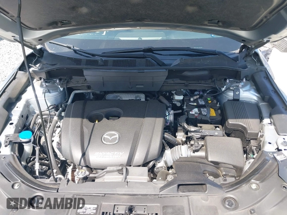 2018 Mazda CX-5 Grand Touring z VIN JM3KFADM7J0318684, wystawiony jako IAAI lot #42226937 z przebiegiem 69 166 mil mil oraz . Historia ofert i sprzedaży dostępna na DreamBid. Obrazek 10.