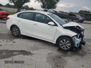 2023 Kia Rio S with VIN 3KPA24AD3PE573452, listed as a Copart auction lot 68249544 with 12,001 mi miles and Non Repairable. Bid and sale history available at DreamBid. Image 4.