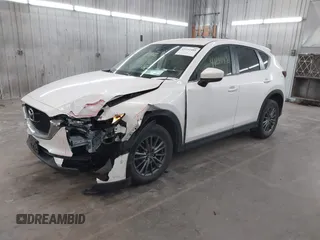 2017 Mazda CX-5 Touring with VIN JM3KFBCL9H0107589, listed as a IAAI auction lot 41241481 with 77,032 mi miles. Bid and sale history available at carsss.com. Image 20.