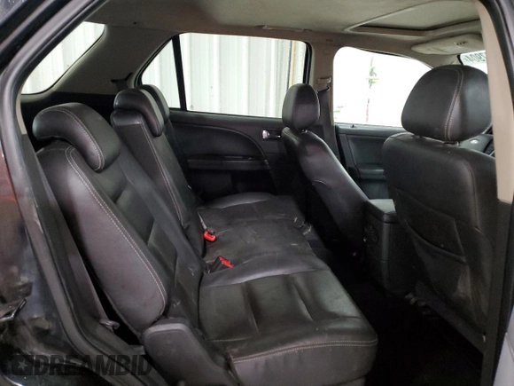 2009 Ford Taurus X Limited z VIN 1FMDK03W89GA00128, wystawiony jako Copart lot #87247904 z przebiegiem 188 844 mil mil oraz Szkoda całkowita • Salvage title. Historia ofert i sprzedaży dostępna na DreamBid. Obrazek 11.