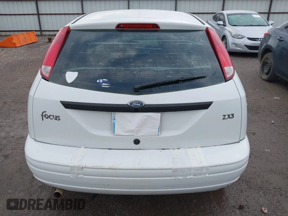 2004 Ford Focus ZX3 with VIN 3FAFP31Z94R120332, listed as a IAAI auction lot 40772071 with 218,128 mi miles and . Bid and sale history available at DreamBid. Image 17.