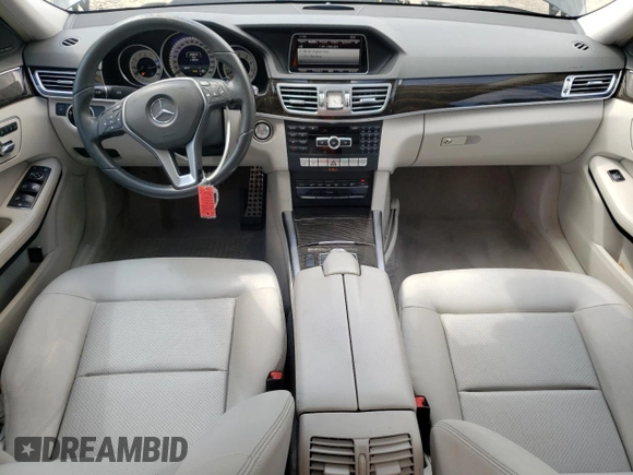 2014 Mercedes-Benz E 350 Sport with VIN WDDHF5KB7EB038257, listed as a Copart auction lot 61251595 with 110,814 mi miles and Salvage title. Bid and sale history available at DreamBid. Image 8.