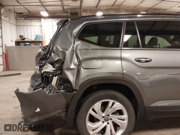 2021 Volkswagen Atlas SE z VIN 1V2KR2CA5MC606590, wystawiony jako IAAI lot #42383813 z przebiegiem 45 087 mil mil oraz . Historia ofert i sprzedaży dostępna na DreamBid. Obrazek 17.