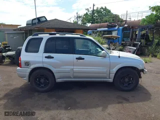 2002 Suzuki Grand Vitara with VIN JS3TE62VX24154173, listed as a IAAI auction lot 41711181 with 224,024 mi miles. Bid and sale history available at carsss.com. Image 14.