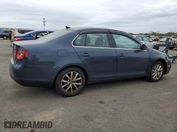 2010 Volkswagen Jetta SE with VIN 3VWRZ7AJ2AM038256, listed as a Copart auction lot 47631015 with 205,579 mi miles and Salvage title. Bid and sale history available at DreamBid. Image 3.