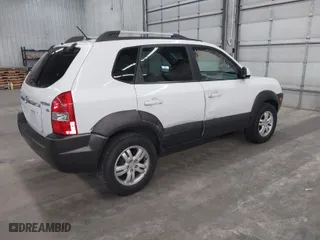 2006 Hyundai Tucson GLS with VIN KM8JN72D86U427695, listed as a IAAI auction lot 41875844 with 161,557 mi miles. Bid and sale history available at carsss.com. Image 4.