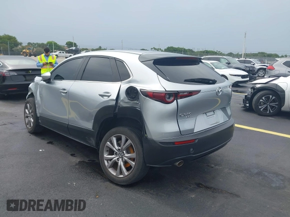2021 Mazda CX-30 Select with VIN 3MVDMBBLXMM246600, listed as a IAAI auction lot 42418629 with 77,713 mi miles and . Bid and sale history available at DreamBid. Image 3.